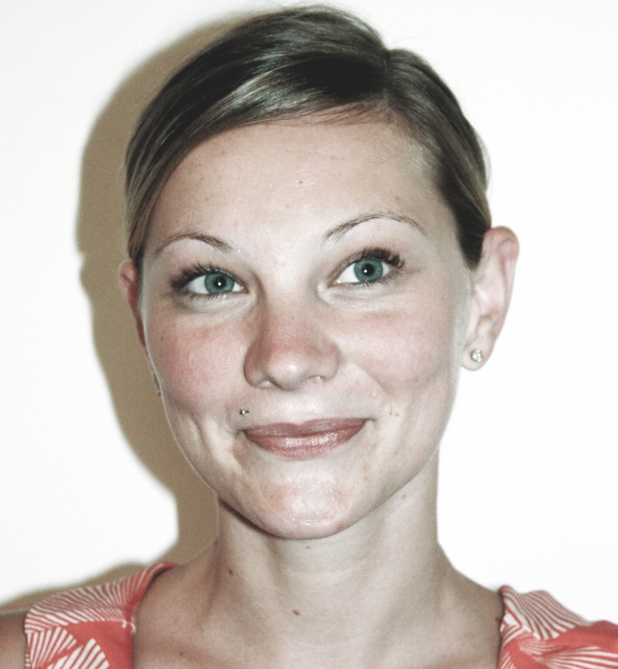 A headshot of Benedetta smiling and looking slightly to the right.